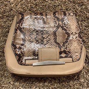 small crossbody purse! used, some damage.